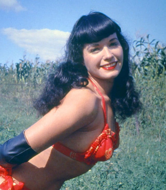 Explore the Fascinating Life of Bettie Page, the Ultimate Pinup Girl - Crypto Zoo Tees