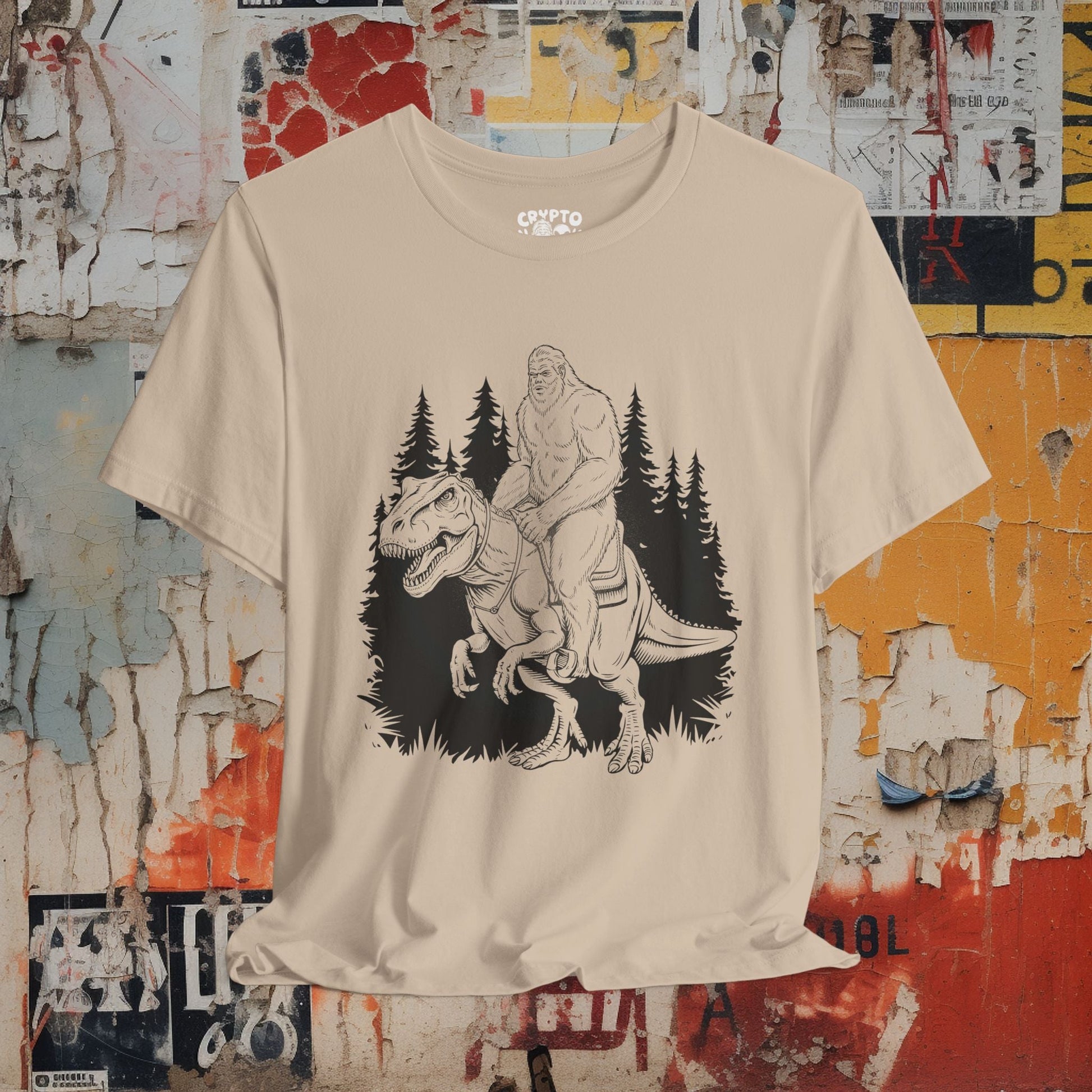 T-Shirt - BIGFOOT on dinosaur Bella + Canvas Unisex T-shirt from Crypto Zoo Tees