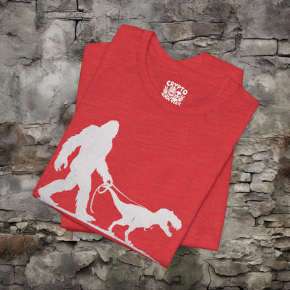 T-Shirt - Bigfoot Walking Baby T-Rex Dinosaur Shirt | Bella + Canvas Unisex T-shirt from Crypto Zoo Tees