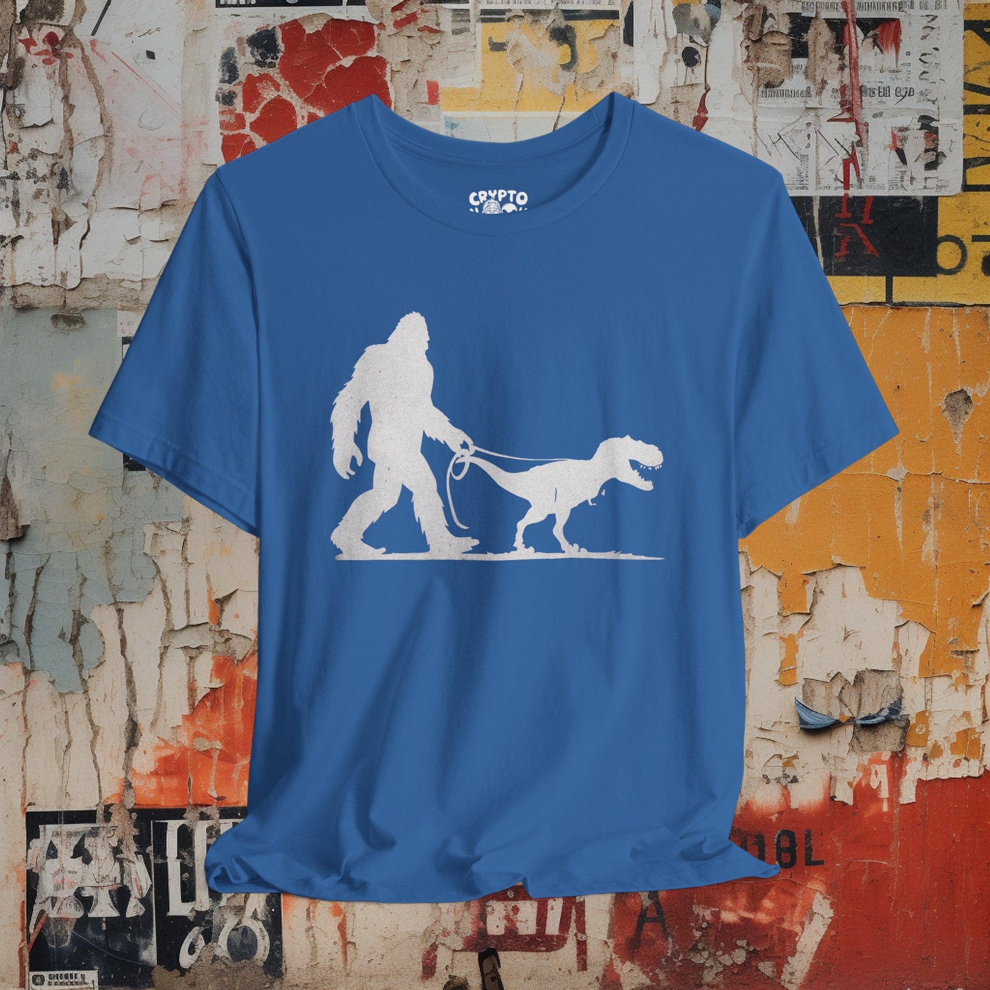 T-Shirt - Bigfoot Walking Baby T-Rex Dinosaur Shirt | Bella + Canvas Unisex T-shirt from Crypto Zoo Tees