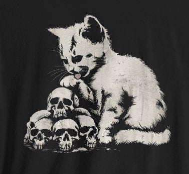 T-Shirt - Cat Licking Paw on Pile of Skulls Dark Humor Shirt | Bella + Canvas Unisex T-shirt from Crypto Zoo Tees