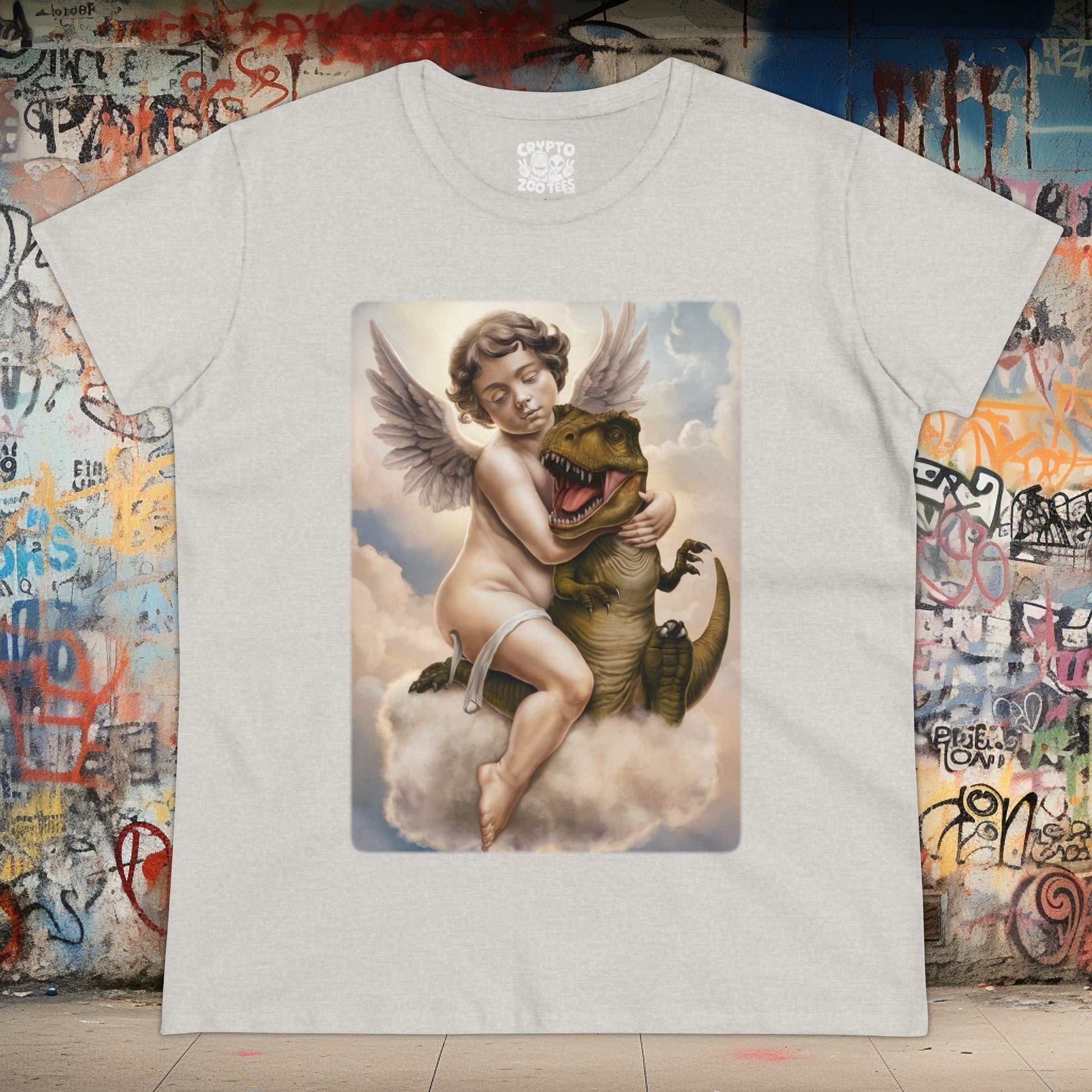 T - Shirt - Cherub Hugging a Baby Dinosaur in Heaven | Funny | Women's T - Shirt | Cotton Tee from Crypto Zoo Tees