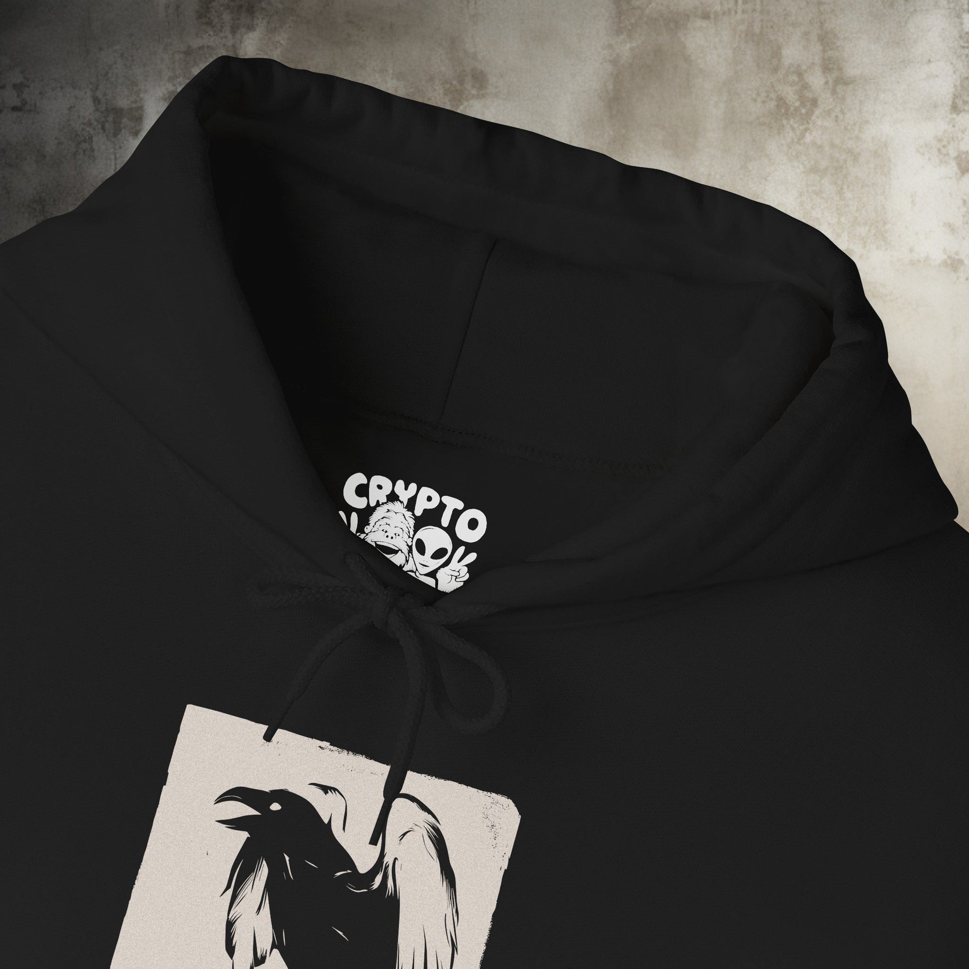 Hoodie - Gothic Raven Perched on Skull Lithograph | Skulls and Skeletons | Hoodie | Hooded Sweatshirt from Crypto Zoo Tees