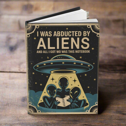 Paper products - I Was Abducted By Aliens Notebook - Funny Matte Hardcover Journal from Crypto Zoo Tees