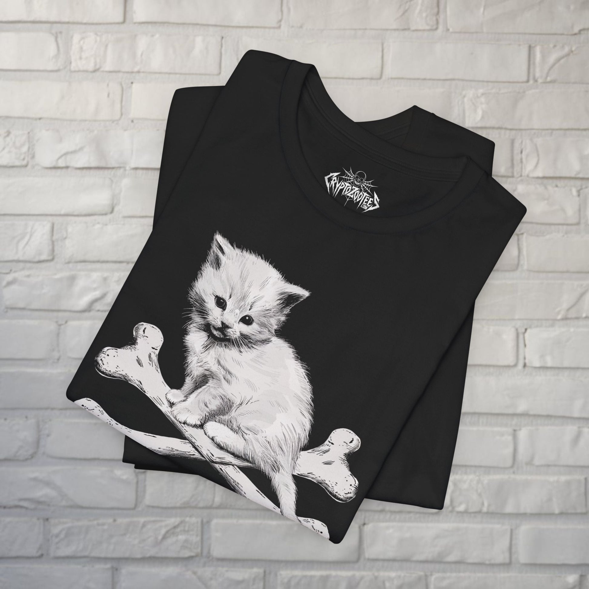 T-Shirt - Kitten and Crossbones T-Shirt | Unisex T-shirt | Cats, Goth | Goth from Crypto Zoo Tees