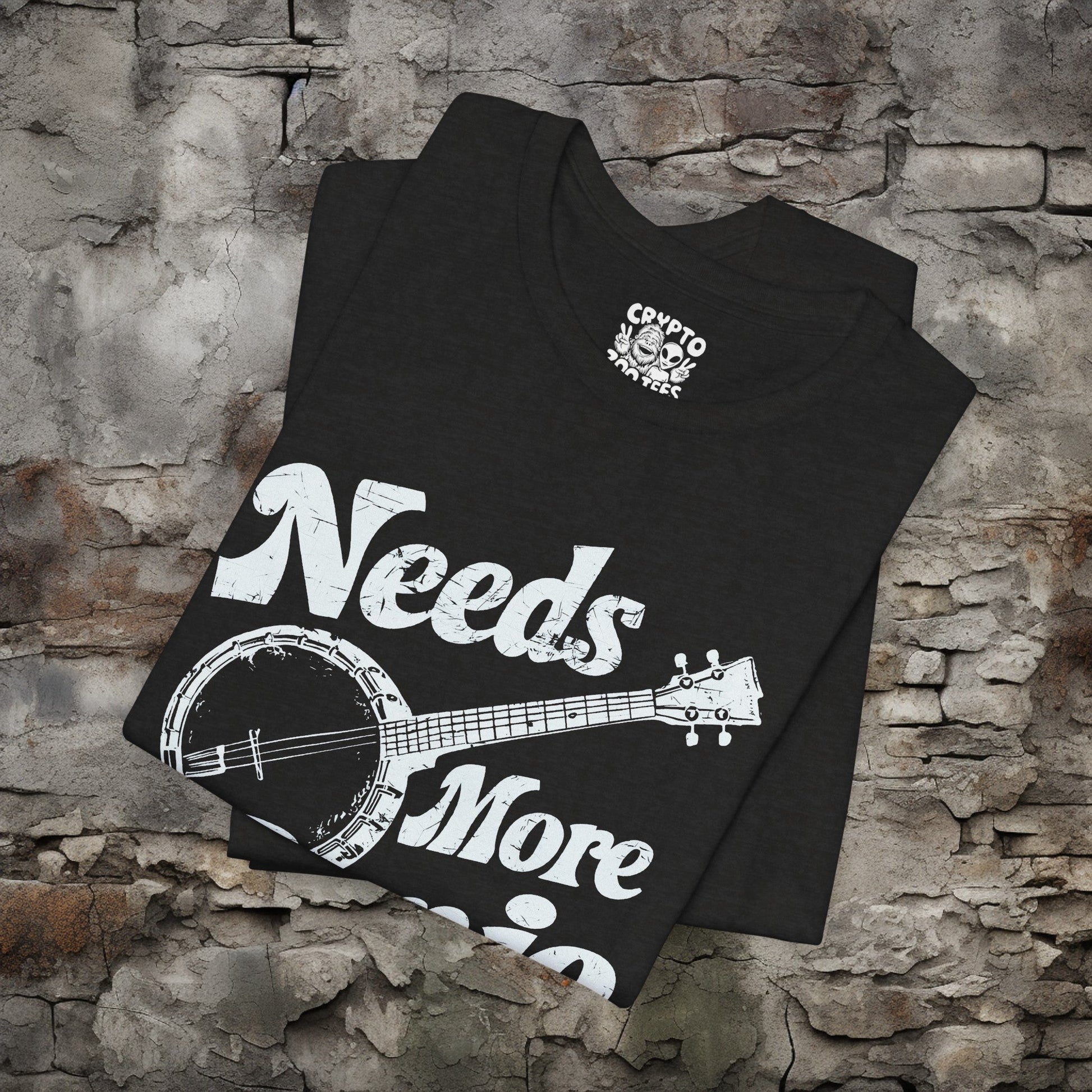 T-Shirt - Needs More Banjo Shirt | Bluegrass Tee | Bella + Canvas Unisex T-shirt from Crypto Zoo Tees