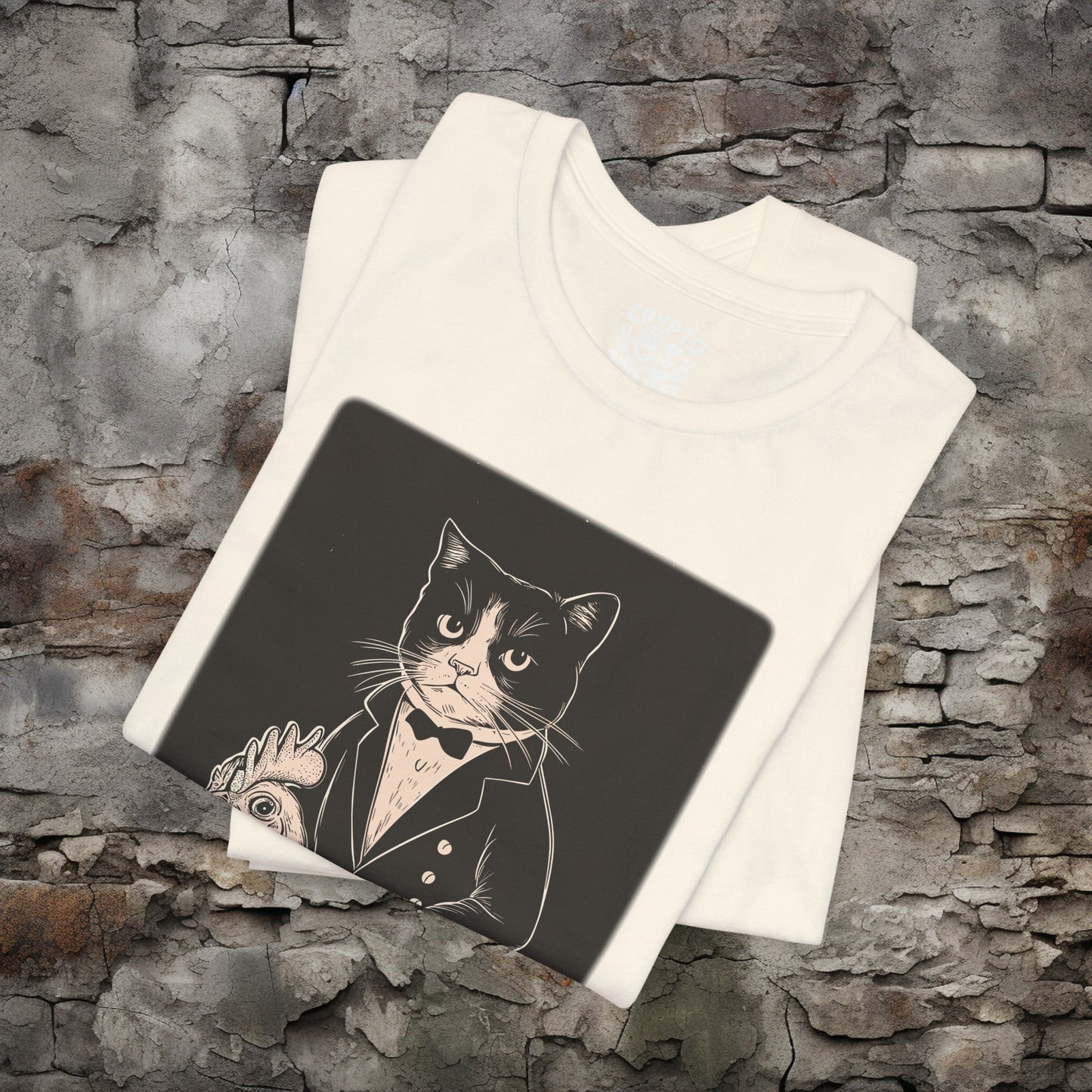 T-Shirt - Tuxedo Cat Riding A Chicken | Bella + Canvas Unisex T-shirt from Crypto Zoo Tees