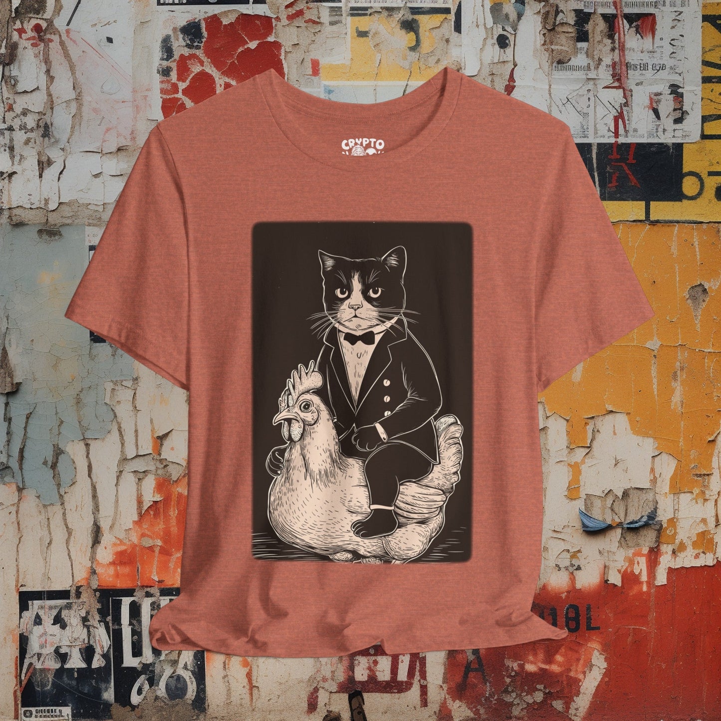 T-Shirt - Tuxedo Cat Riding A Chicken | Bella + Canvas Unisex T-shirt from Crypto Zoo Tees